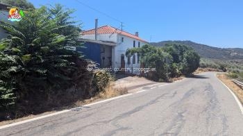 Iznajar, spacious 4 bed, 3 bath detached country property which comes with a large workshop and garage, plus outbuildings.
