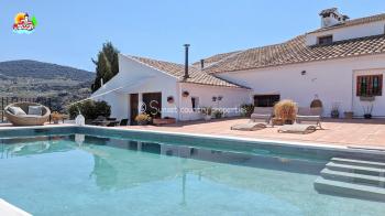 Iznajar, beautiful restored spacious 6 bed, 5 bath traditional style Andalucian farmhouse with wonderful outside space and large 9m x 5m swimming pool.