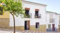 7551, Archidona, Charming 3 bedroom town house with 2 good size typical Andalusian patio's with natural shade from the grapevine and double garage situated in the centre of the town.