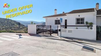 Iznajar, delightful 4 bedroom, 2 bathroom plus w.c end of terrace town property with stunning views of the lake & castle.