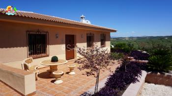 Villanueva del Trabuco,  beautiful, single story 3 bedroom detached country villa with well kept gardens and 11m x 5m salt water heated swimming pool.