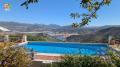 7610, Iznajar, stunning 5 bedroom 5 bathroom country property with breathtaking views of the Lake, large swimming pool and spacious sun terrace, garage.